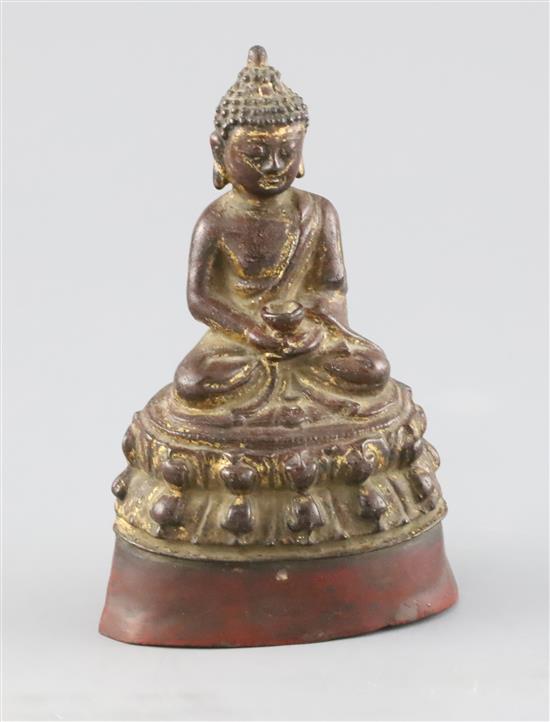 A Chinese lacquered bronze figure of Buddha Shakyamuni, 17th century, H. 14.5cm